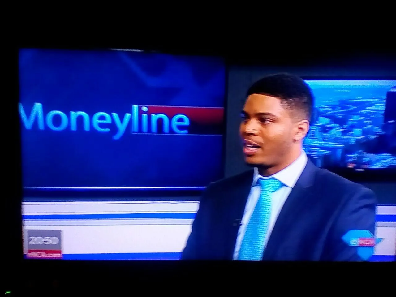 Neil being interviewed in a television studio