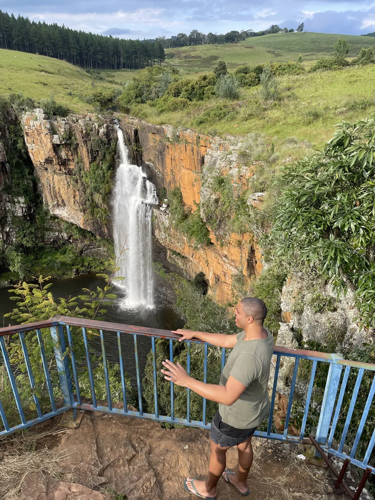 Neil at a viewpoint above a waterfall